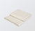 folded natural colored flat sheet