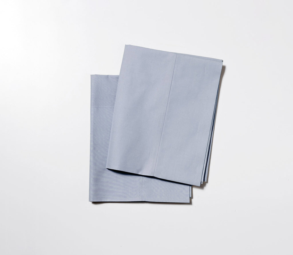 two folded sateen sheet for sleep