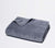 Folded Slate Blue Classic Bath Towel with white background.