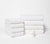 white folded bath towels