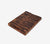 Bottom side of the End-Grain hand crafted, black walnut, rectangular cutting board with a white background.
