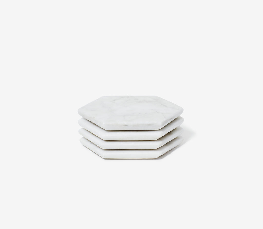 collection of white marble coasters