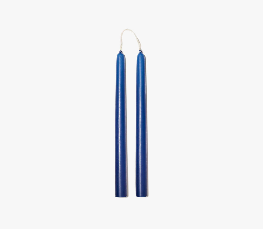 two blue colored candles