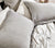 grey colored pillow and bedding set