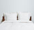 white cotton sham and bedding set