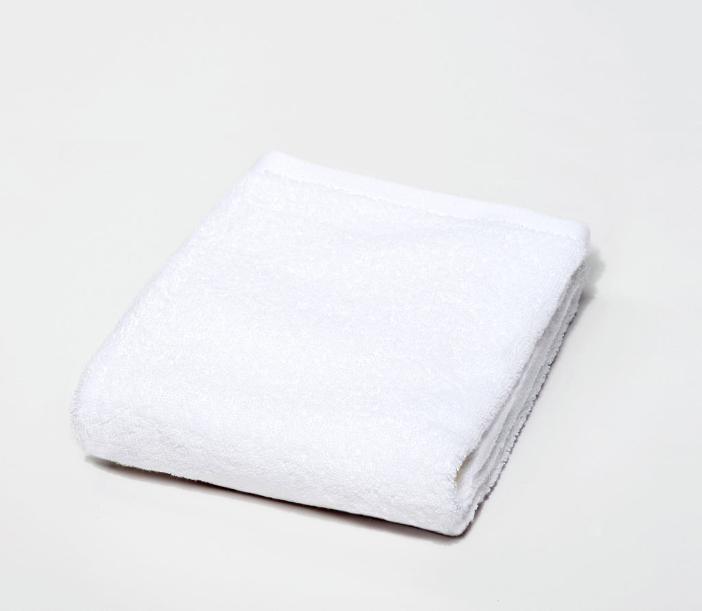 white absorbent and quick drying cotton folded hand towel