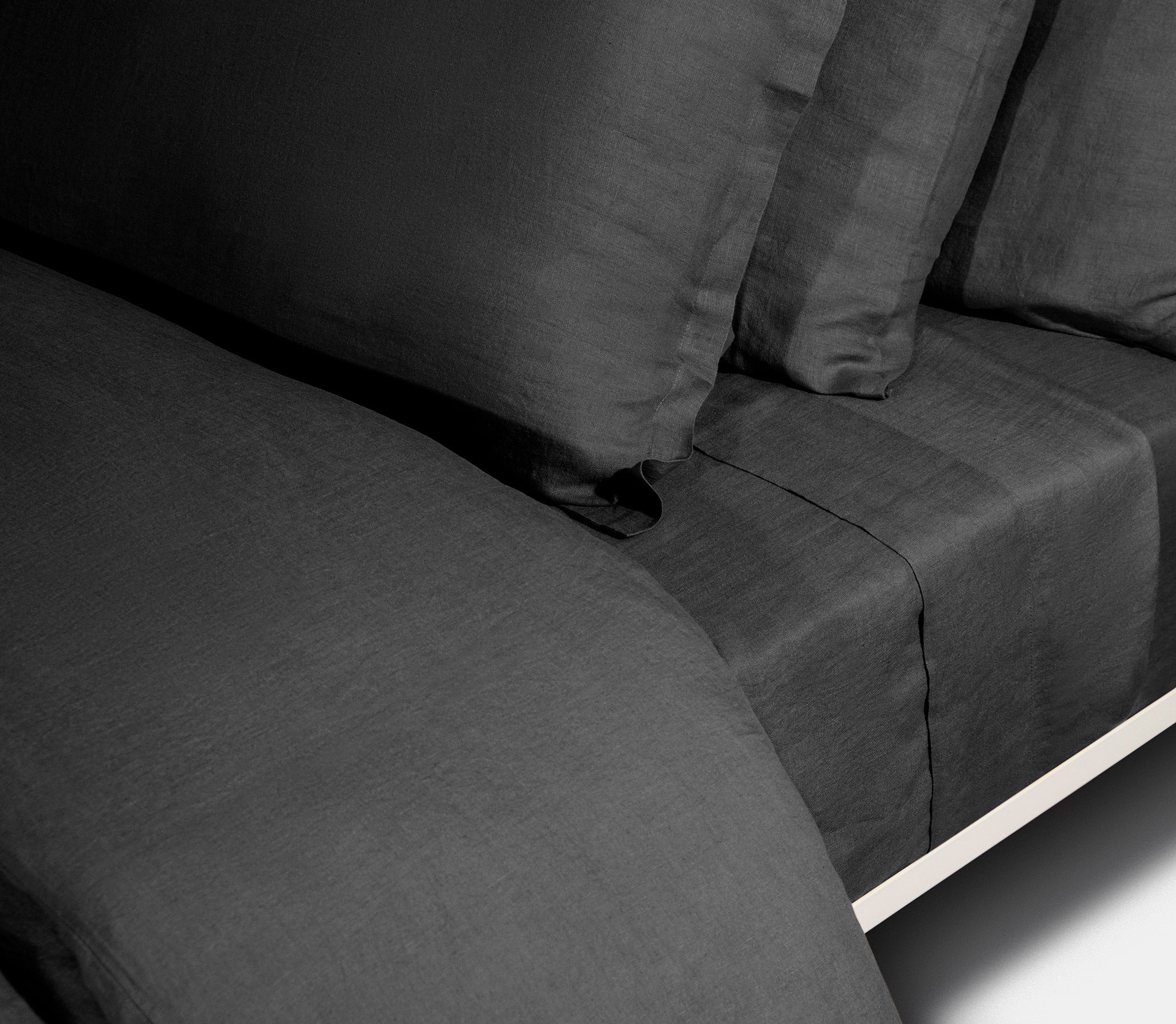 black pillows and black duvet cover